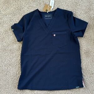 Scrub top! New with tags, comfortable for any healthcare professional.